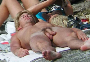 nude-beach-men-sunbathing.webp