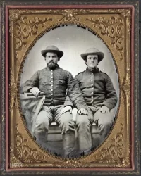 1861-65. Pvt. Charles Chapman of Company A, 10th Virginia Cavalry Regiment (left), and uniden...webp