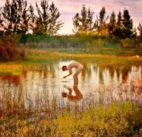 naked-boy-in-bog.webp