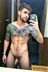 tattooed-guy-tiny-penis.webp