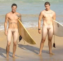 surfers-naked-at-the-beach.webp