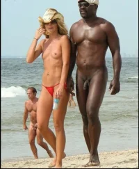 Blonde_White_MILF_in_Holydays_Find_a_Black_Mamba_at_the_Naturist_Beach.webp