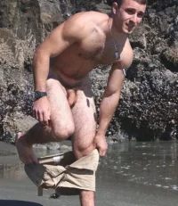 sexy-man-getting-naked-390x450.webp