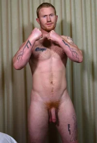 Muscular-tattooed-redhead-Colby.webp