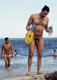 hung-uncut-nudist-man-.webp