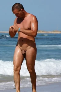 nudist-man-with-small-uncut-cock.webp
