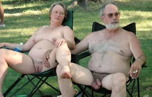 2060-Extremely-bold-old-couple-in-a-complete-and-utter-nudity-enjoying-the-chill.webp