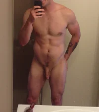 nude-muscle-guy-with-soft-dick.webp