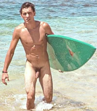 nudist-surfer-guy-picture.webp