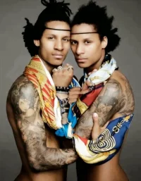 Bourgois twins holding close.webp