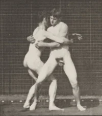 Nude_men_wrestling,_lock_(rbm-QP301M8-1887-345a~3).webp