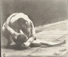 Nude_men_wrestling_(rbm-QP301M8-1887-520c~1).webp