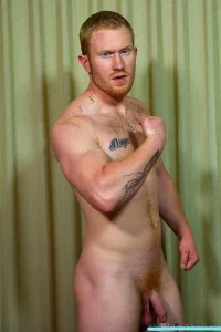 Muscular-redhead-Colby-bottoms-.webp